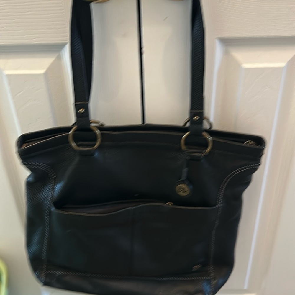 Black bag used in good condition has a little small scratch on the bottom